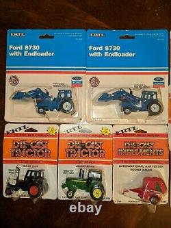 ERTL 1/64 NIB Lot of Tractors & Equipment Ford John Deere Case New Holland